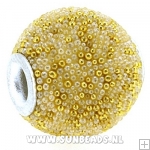 Kashmiri kraal rond (beige met gouden spikkels)