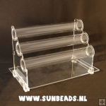Armband standaard, liggend, plexi, transparant, 3 rollen Armband standaard, liggend, plexi, transparant, 3 rollen