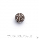 Halfedelsteen rond gecarved